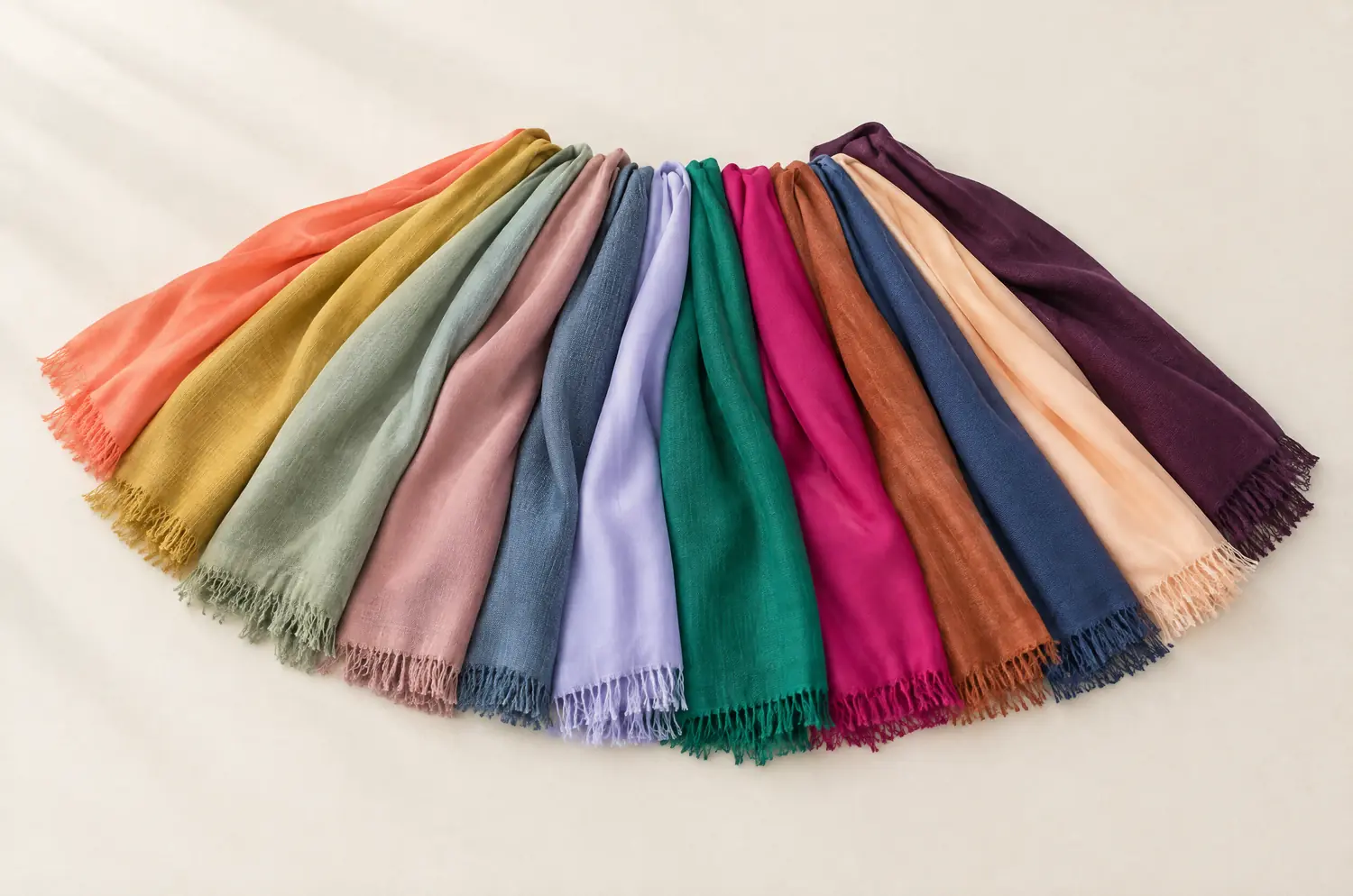 Scarves in varied colors draped in a fan for a color draping test
